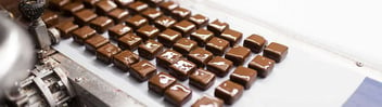 Chocolates on food production line