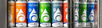 Multi-coloured Activate lubricant aerosol cans